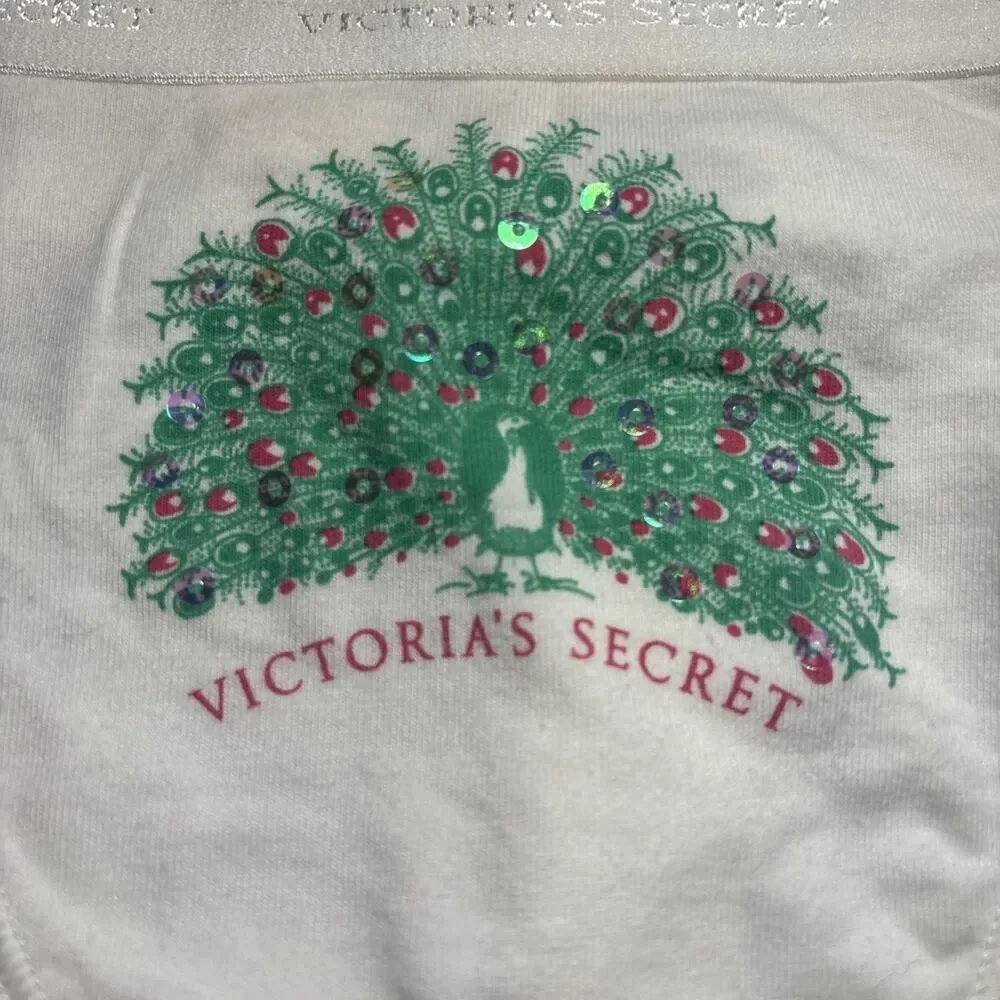 VTG. Victoria Secret white with Peacock image Thong Size LG. NEW Cotton